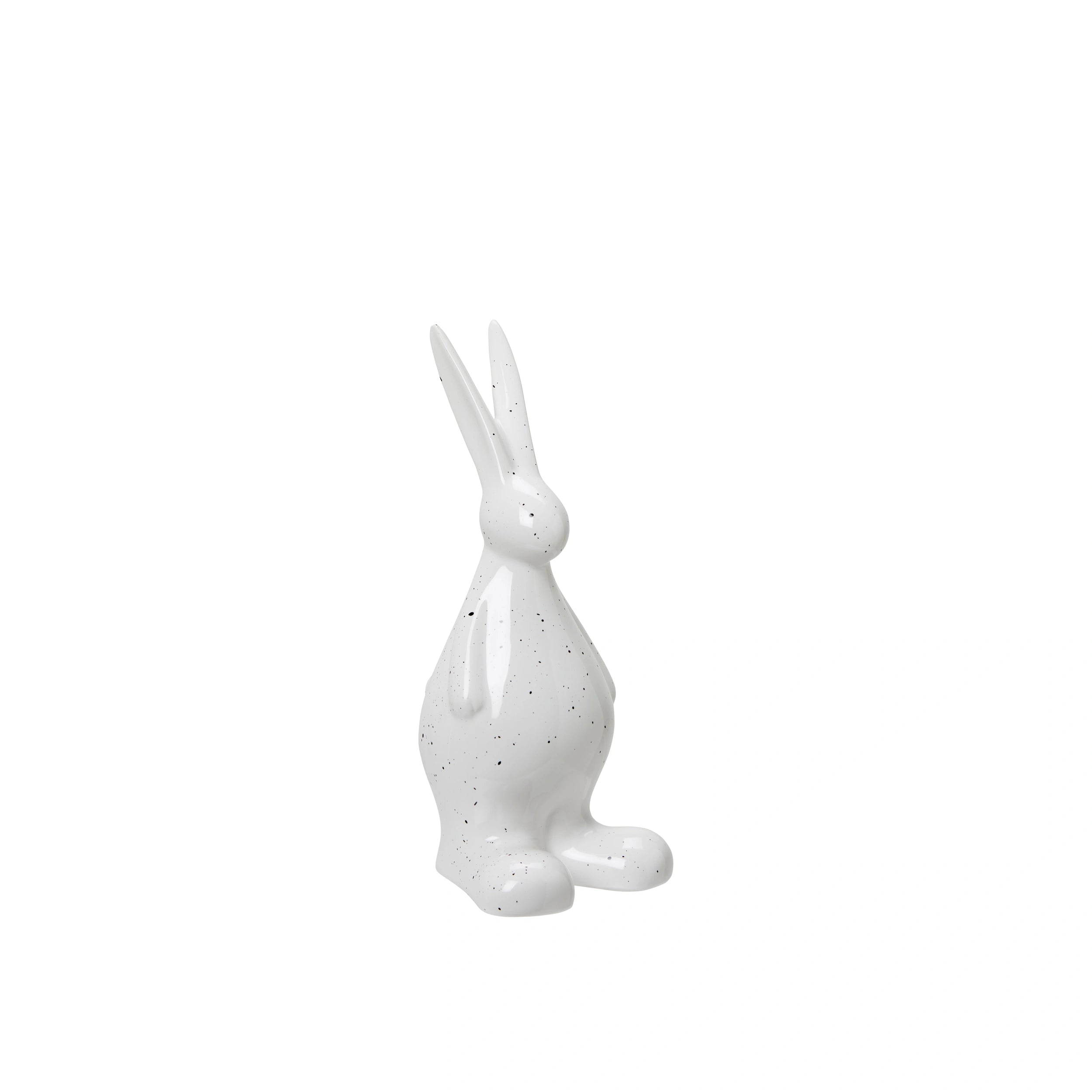 White ceramic hare figurine on a white background