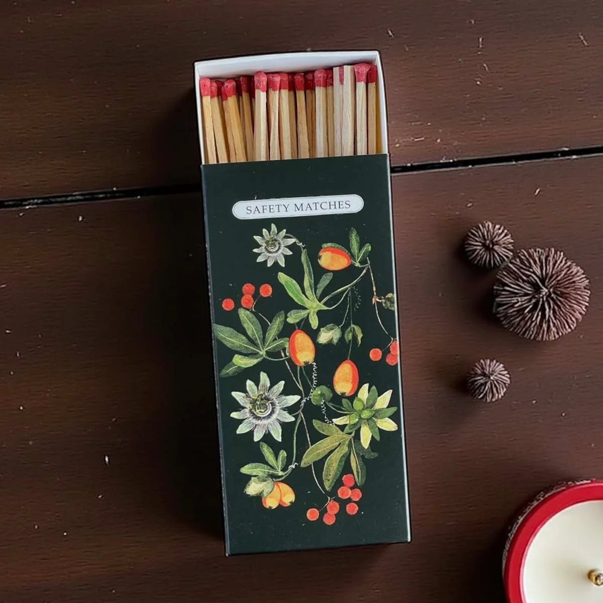 Matchbox with botanical design.
