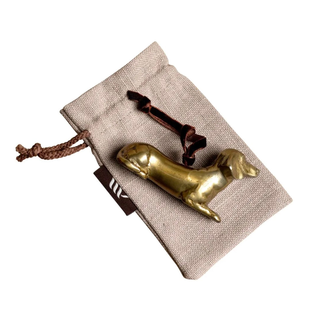 Brass Dachshund-shaped hanging decoration with linen gift bag.