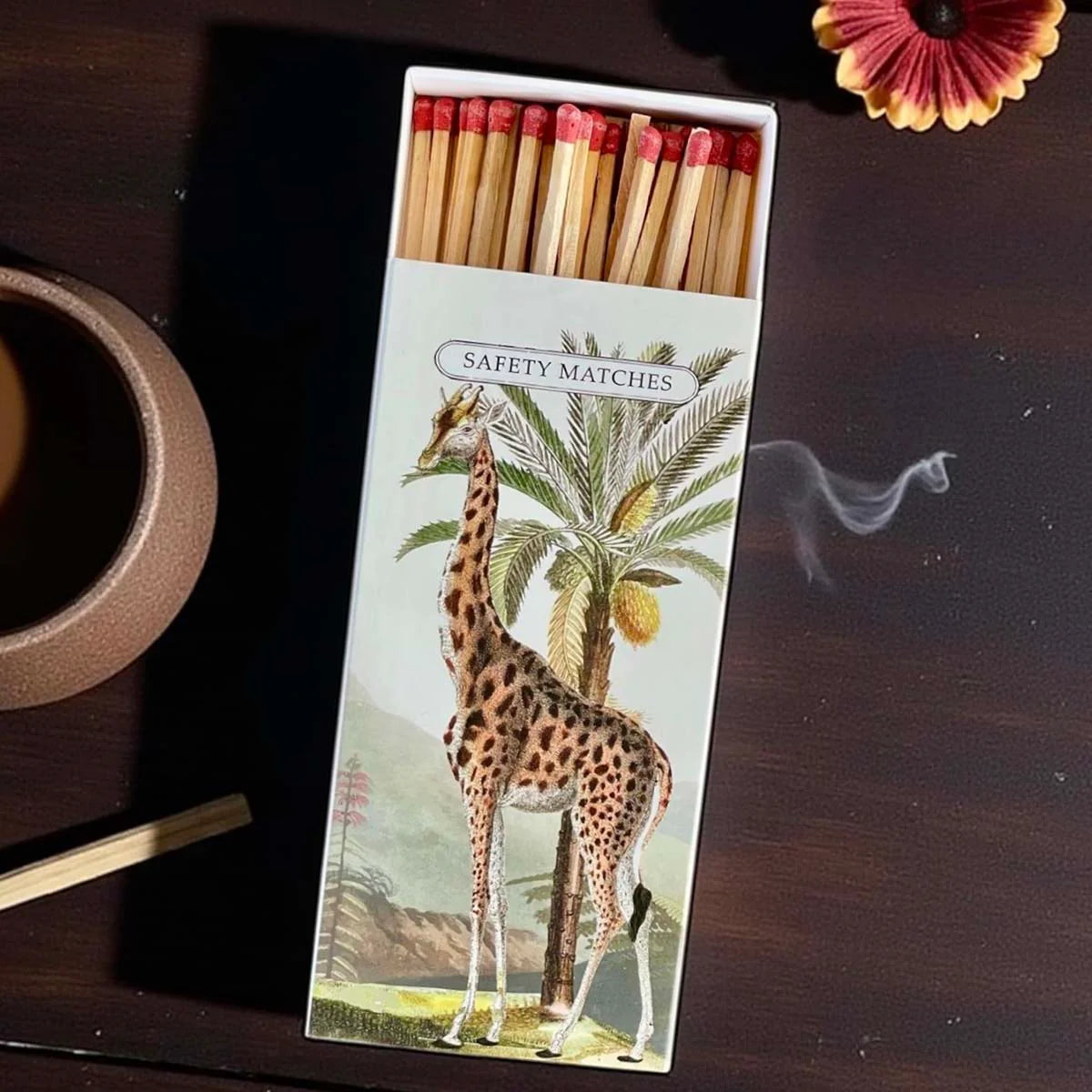 Matchbox with giraffe design.
