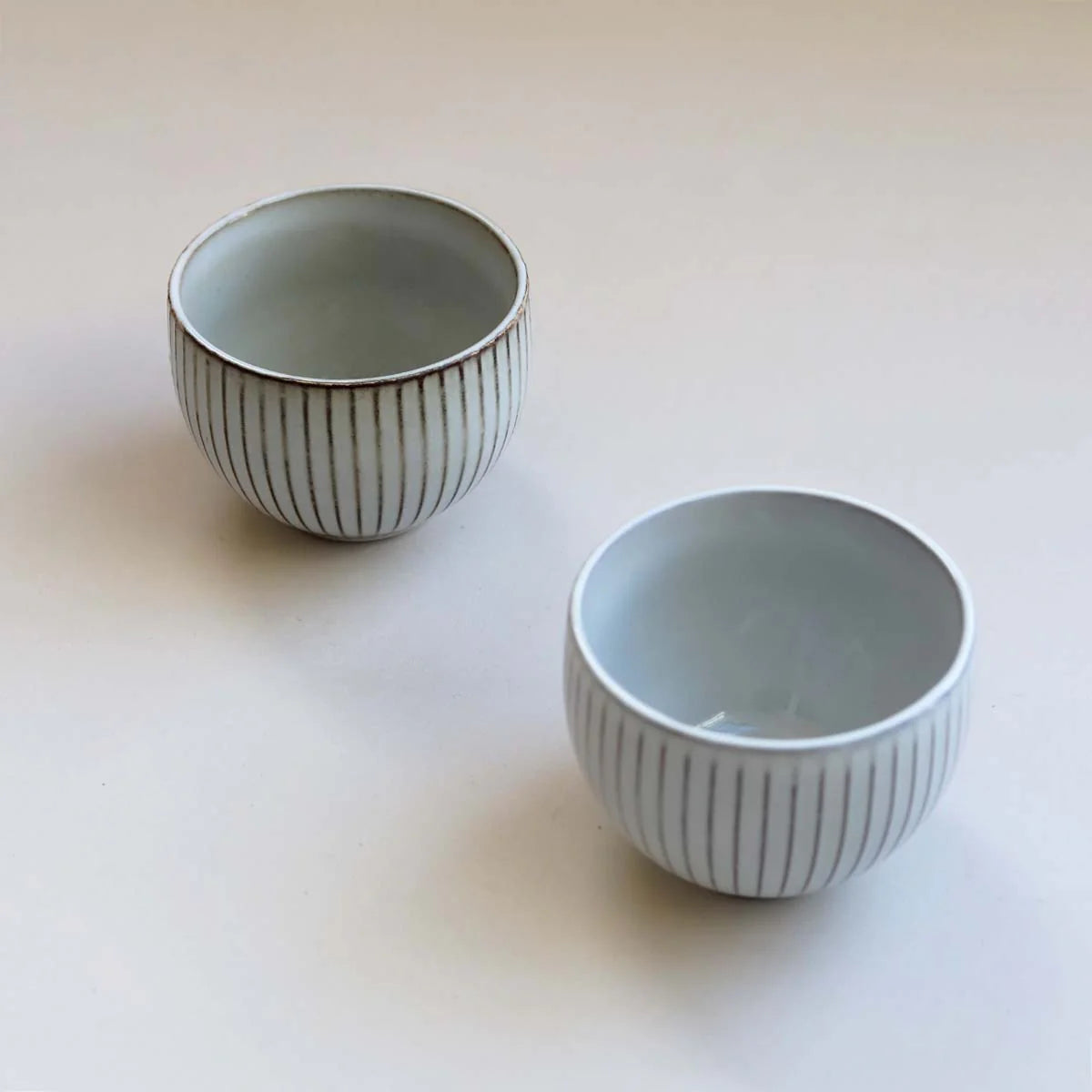 Grey Ceramic Bowls with narrow stripes.