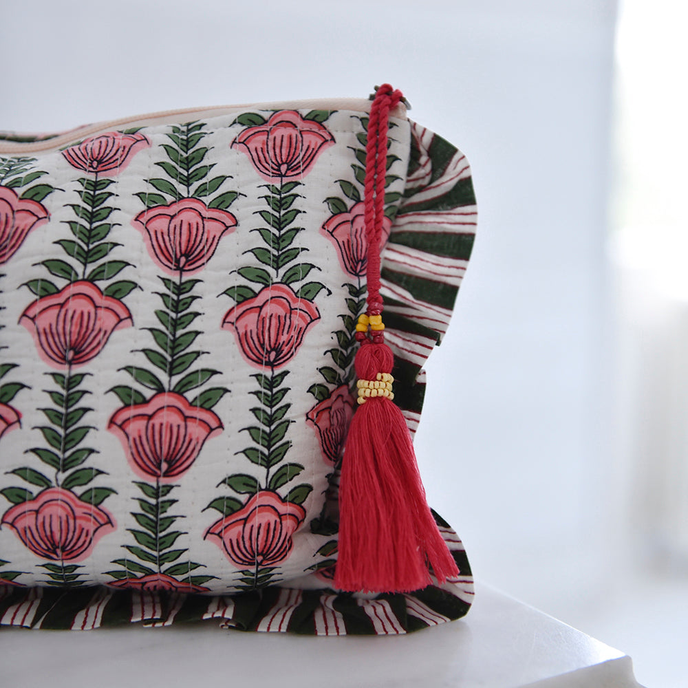 Detail of tulip block print make up bag with ruffle trim