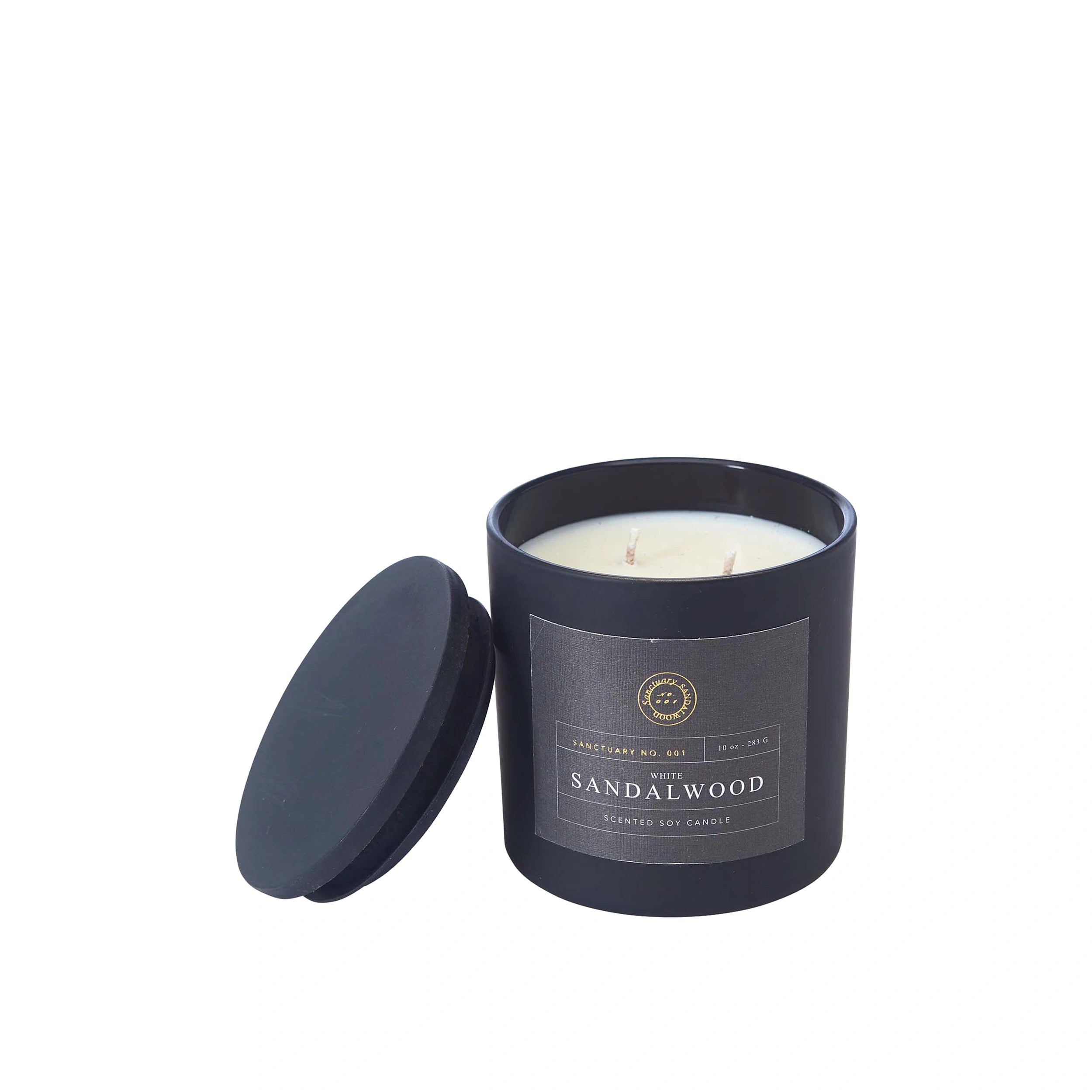 Soy scented candle in navy container with 'Sandalwood' label.