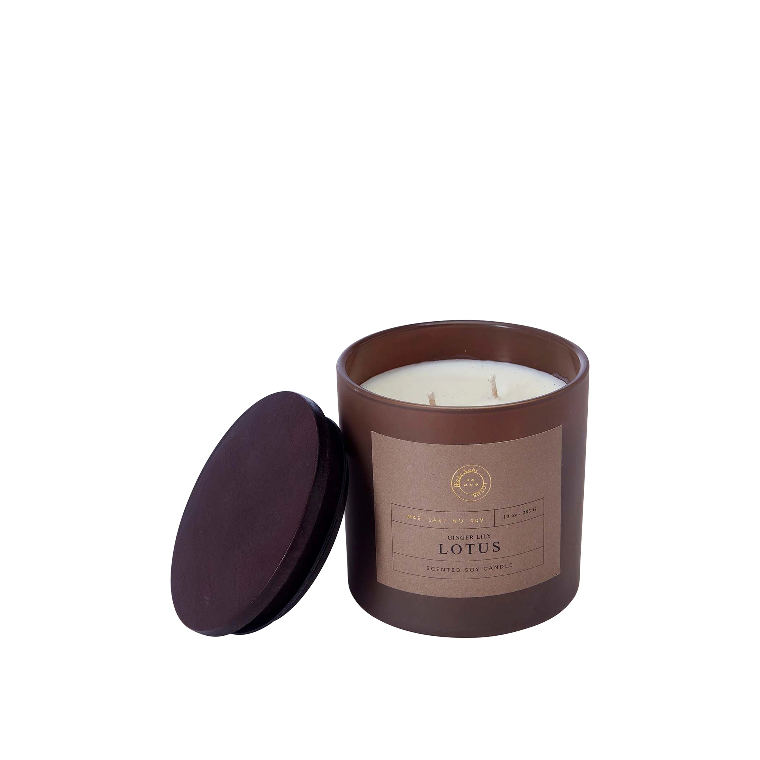 Scented soy candle in brown jar with 'Ginger Lily Lotus' label.