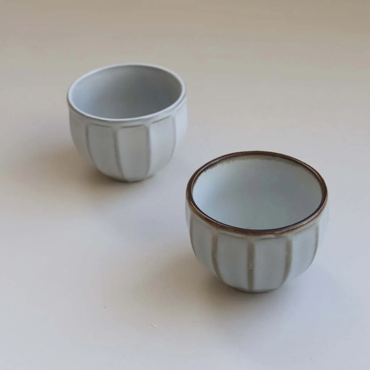 Ceramic bowl with wide stripes.