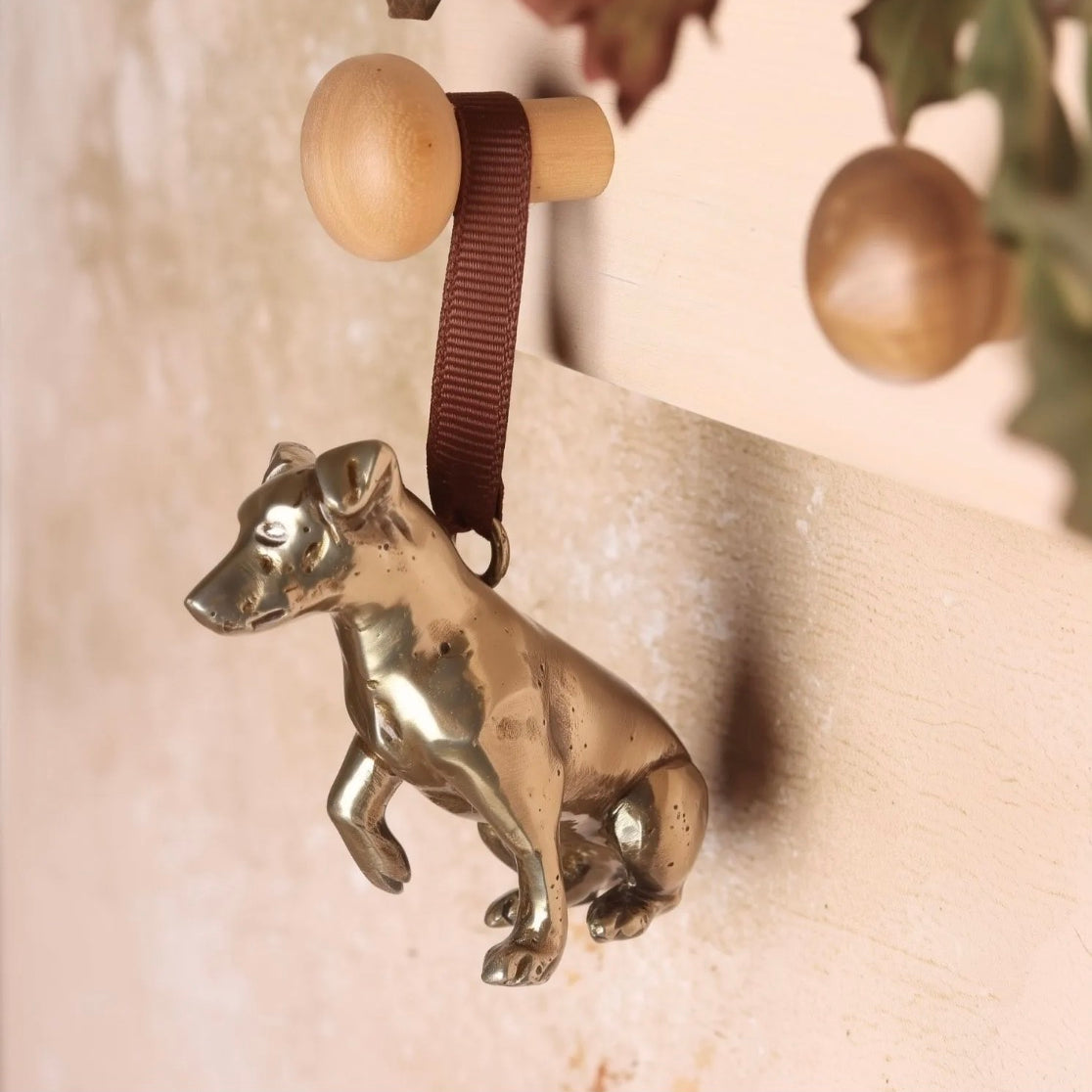 Brass Jack Russell shaped hanging decoration.
