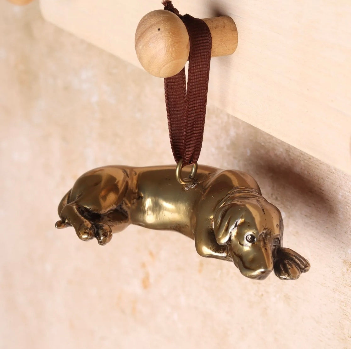 Brass Labrador shaped Christmas handing decoration.