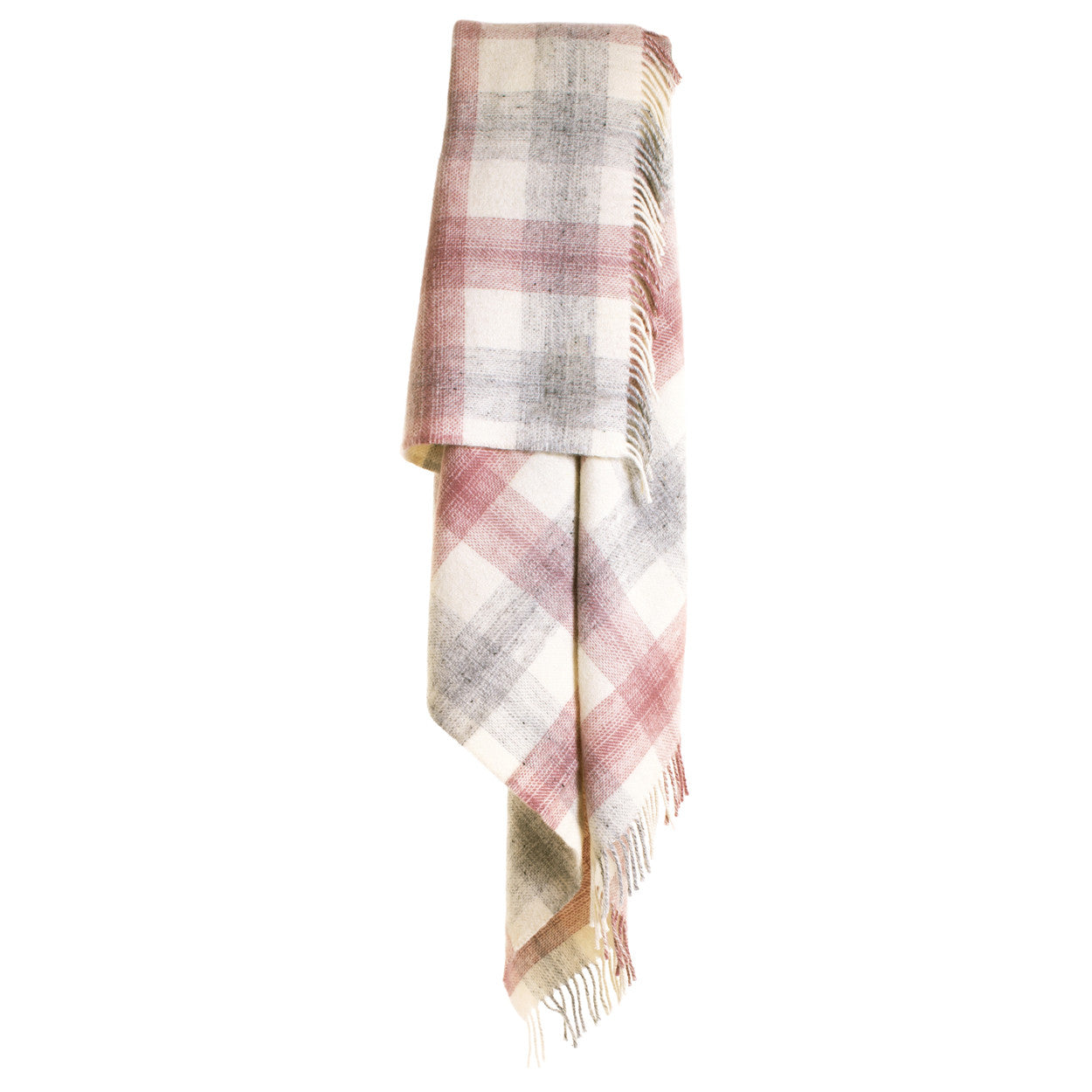 Meadow check throw in dusky pink draped