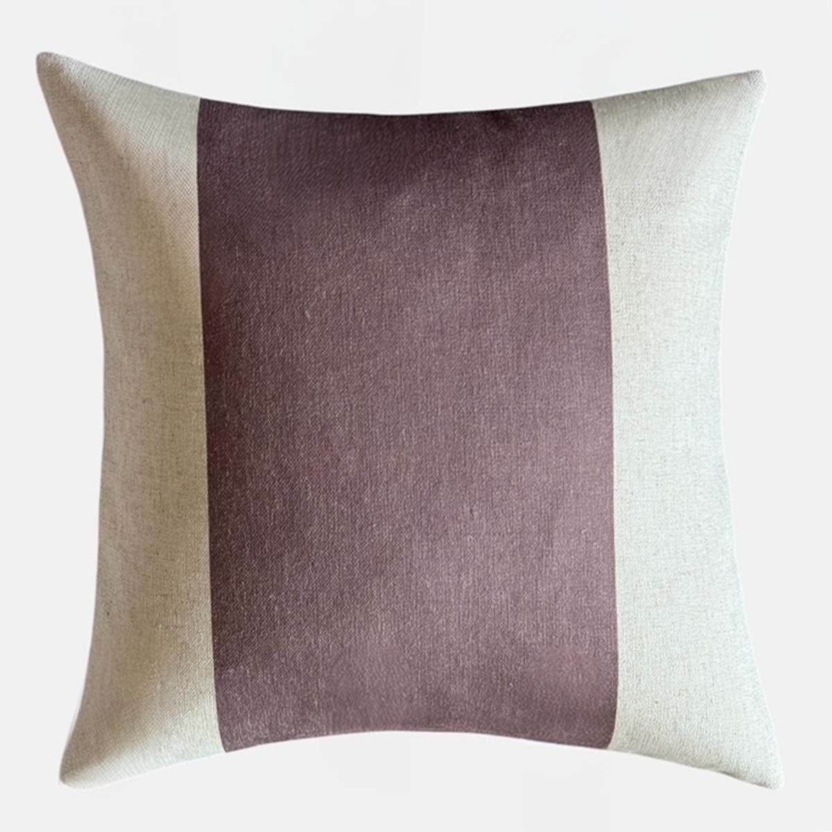Decorative throw cushion with a wide claret red and off white block design on a white background