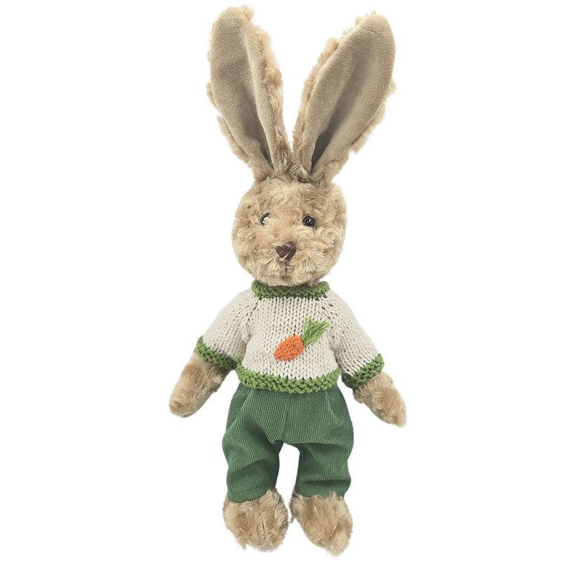 Rabbit teddy bear wearing a hand knitted carrot jumper.