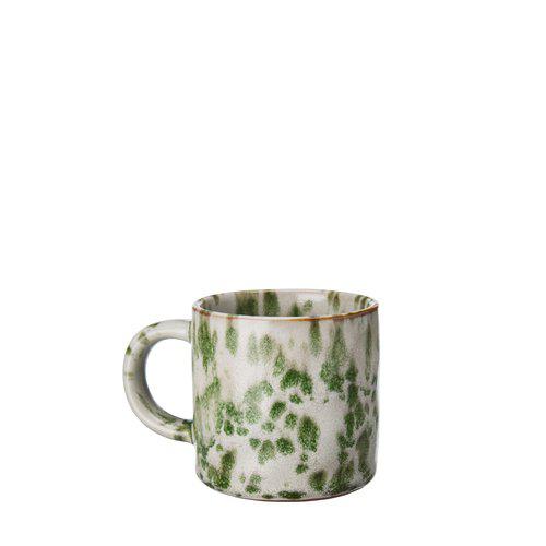 White mug with melange design in various shades of green.