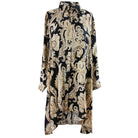 Black and gold dress with  pattern on a white background