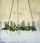 Metal chandelier to hold candles
