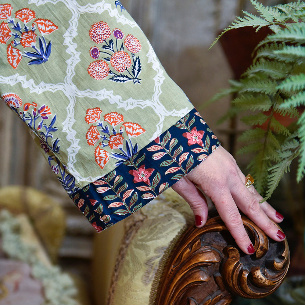 Cuff detail of olive green floral dressing gown lifestyle by The Black Faced Sheep