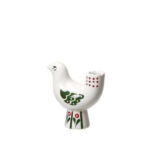 White bird candle holder with red and green decoration.