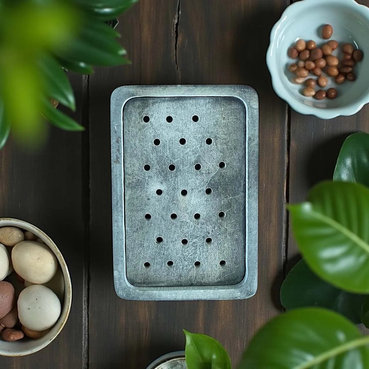 Rectangular grey marble soap dish.