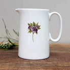 Bone china jug with hellebore design.