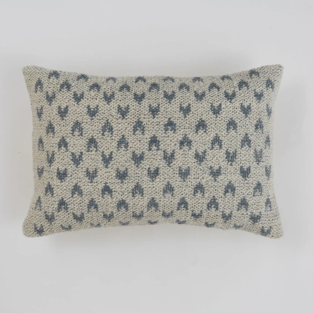 Mhari decorative cushions with blue heart design on neutral background.