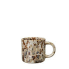 White mug with melange decoration in a variety of browns.