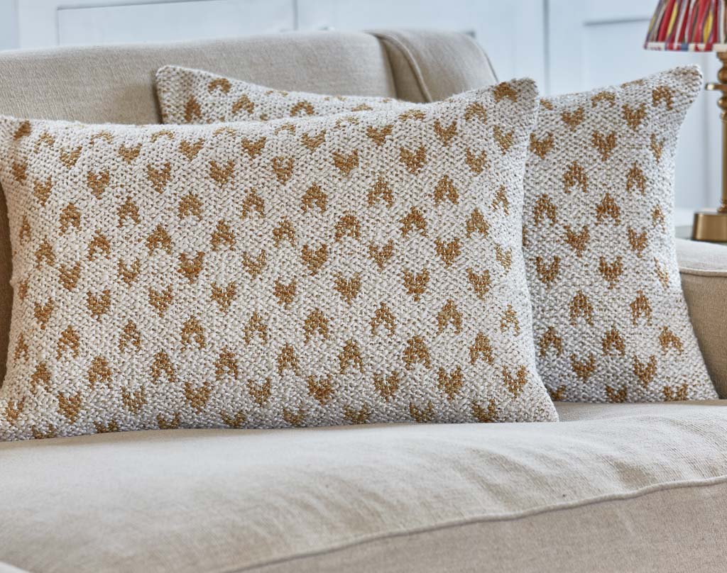 Mhari sofa cushion ecru with gold heart shaped motif