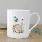White bone china mug with Jemima Puddle-Duck design.