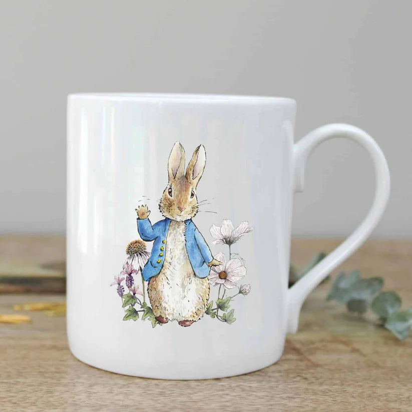 White bone china mug with peter rabbit design.