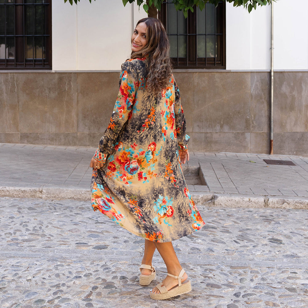 Viscose floral shirt dress in orange, turquoise, grey and red.