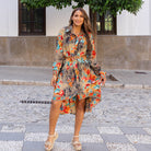 Viscose floral shirt dress in orange, turquoise, grey and red.