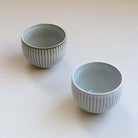 Grey Ceramic Bowls with narrow stripes.