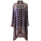Long patterned shirt dresson a white background