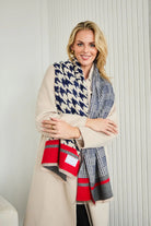 Blue and white dogtooth scarf with contrasting trim.