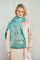 Turquoise floral winter scarf.