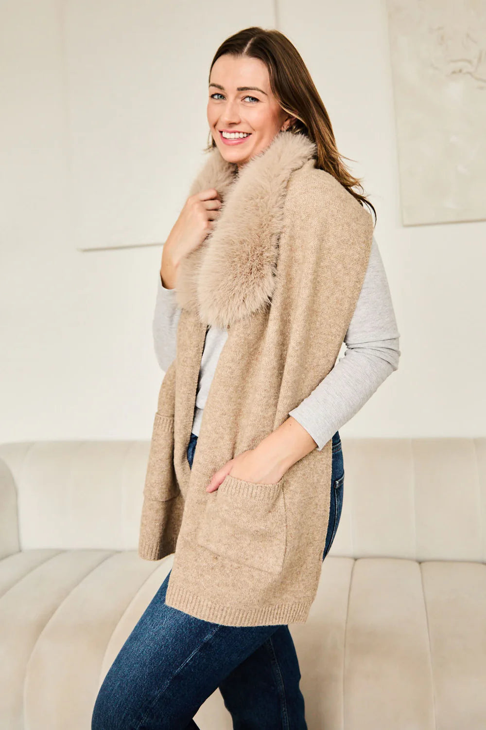 Coffee coloured scarf with fur trim.