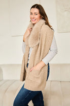 Coffee coloured scarf with fur trim.