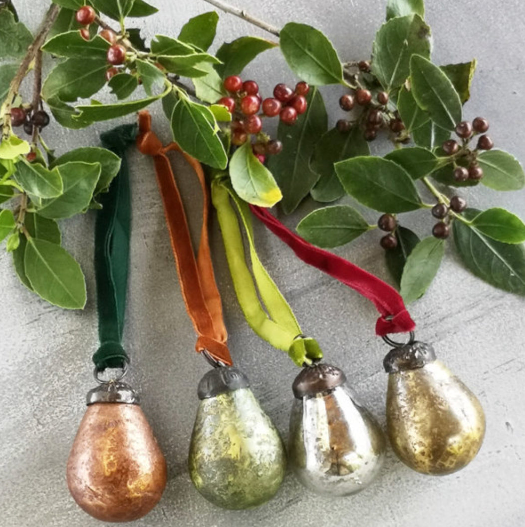 Bronze, green, silver and gold pear hanging decoration on coloured ribbons.