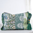 Green patchwork print wash bag with green tassel.