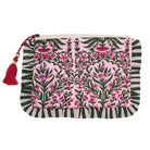 Back damask print make up bag with ruffle trim lifesstyele against white tiled background cut out