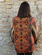 Red, Black and Gold reversible printed cotton quilted jacket.