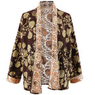 Brown, gold and white reversible quilted jacket.
