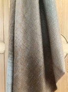 Detail of traditionally woven Mohair Throw in parchment colours or beige, stone, and shades of rich browns.