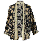 Black and gold reversible printed cotton quilted jacket.