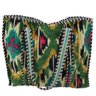 Detailed cut out of velvet ikat shopping bag lifestyle