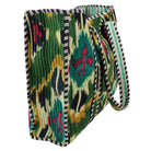Side view of velvet ikat shopping bag cut out