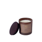 Scented soy candle in brown jar with 'Ginger Lily Lotus' label.