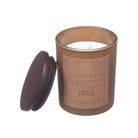 Candle in brown jar with 'Wabi Sabi Ginger Lily Lotus' label.