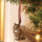 Brass cat hanging ornament.