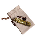 Brass Greyhound-shaped Christmas decoration with a linen gift bag.