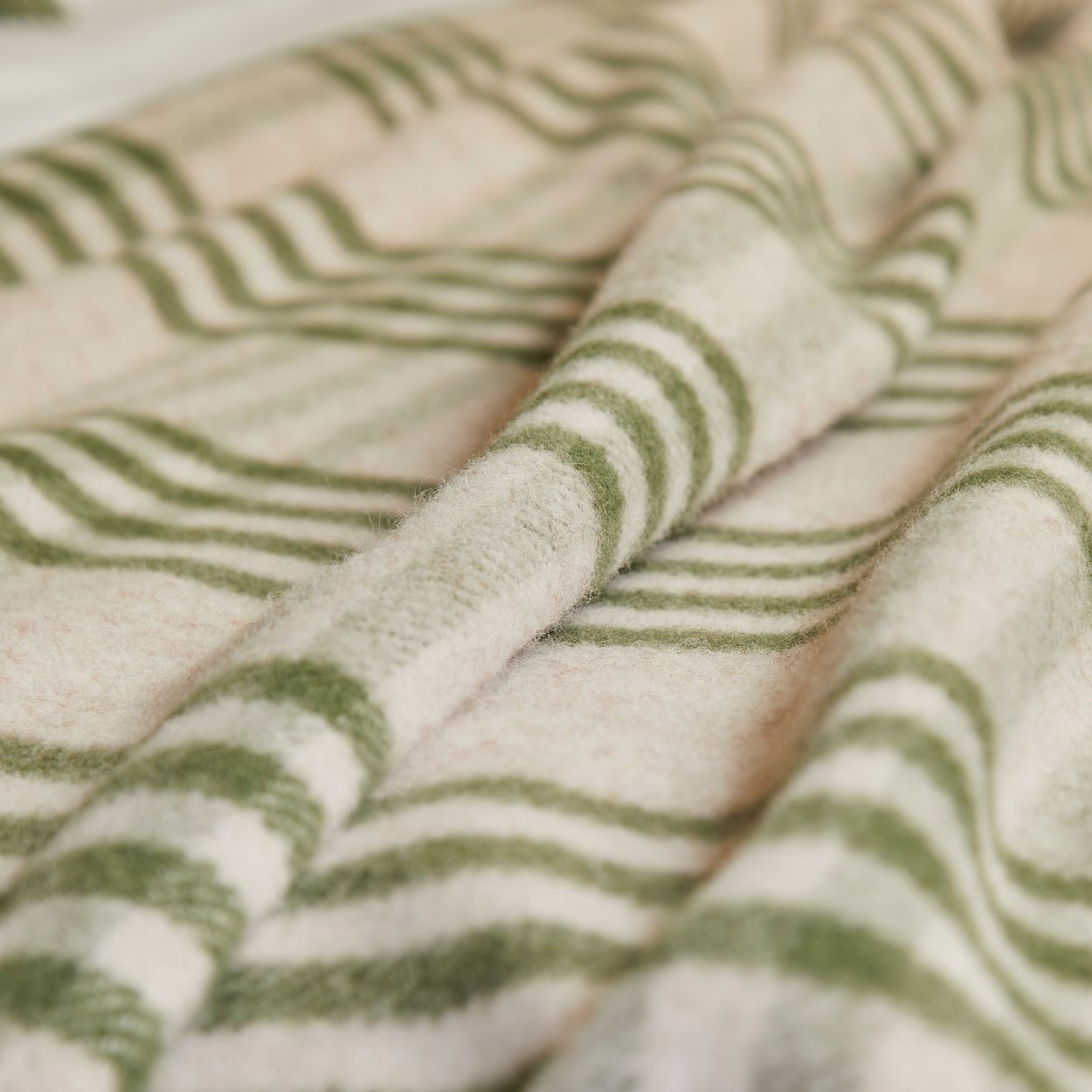 Close up of  Olive Hex Wool Throw 