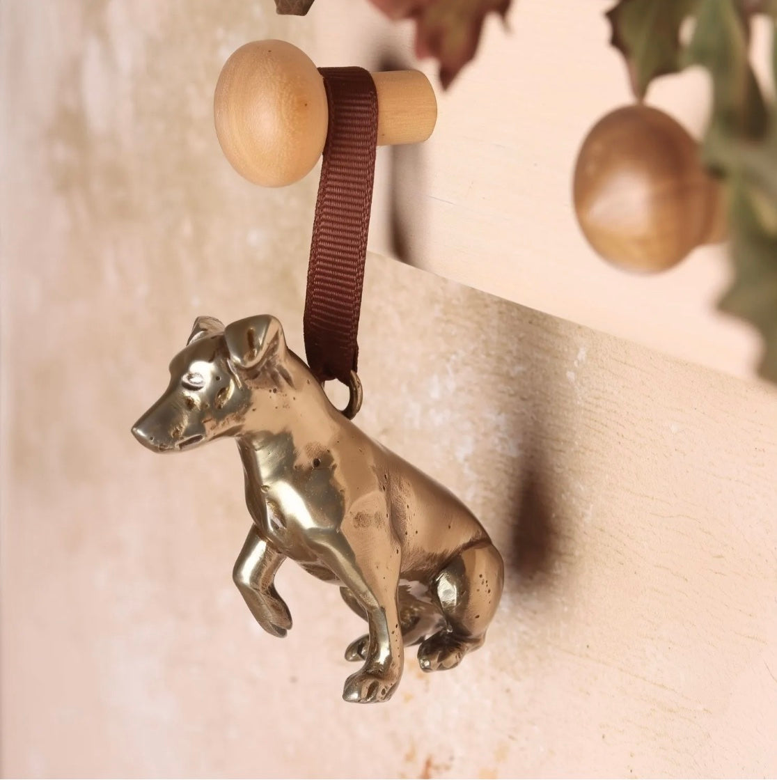 Brass Jack Russell shaped hanging decoration.