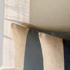 Detail of cushions with oversized blue stripe.